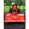 rotary tiller on sub-compact tractor